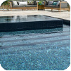 GC210 Peacock with Silver Marble used as coping and surrounds of the pool