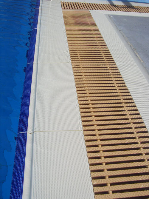 Serapool grate and finger grip pool deck tiles