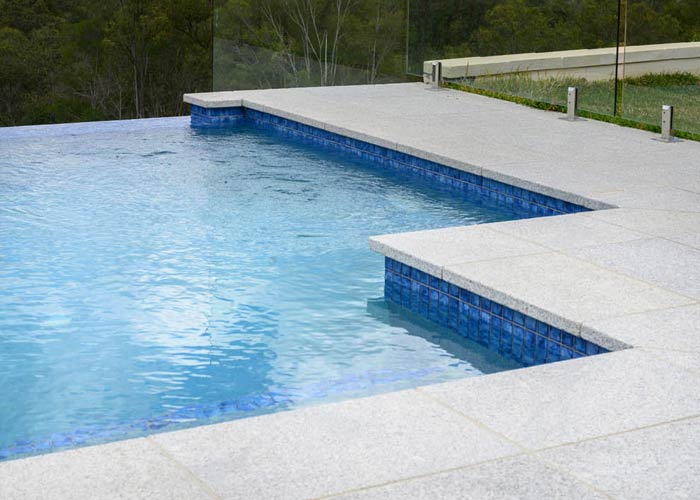 Light Grey Granite Pool Tiles and Pavers. Outdoor Pavers and Coping