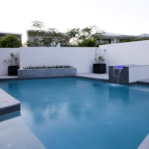 Light Grey Granite Pool Pavers Evening photo