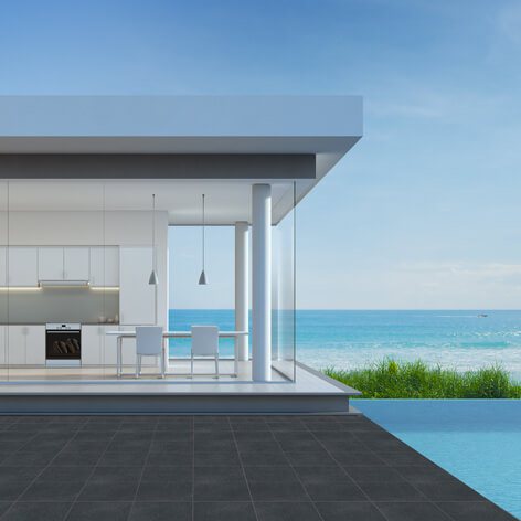Meteor Granito tiles shown around a pool