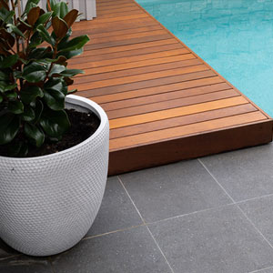 Meteor Granito tiles shown around a pool