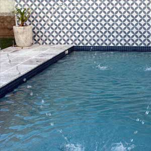 CM098 Ocean Blue ceramic mosaic pool tiles in place