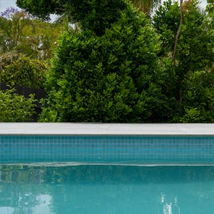 CMC129 Ice Blue 23mm mosaic pool tiles used as waterline tiles and step marker tiles