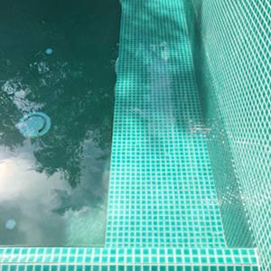 CMC327 Celtic Sea 23mm ceramic mosaic pool tiles in place