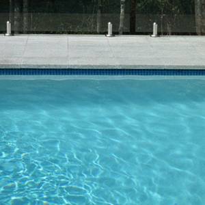 CMC330 Atlantic 23mm ceramic mosaic pool tiles in place