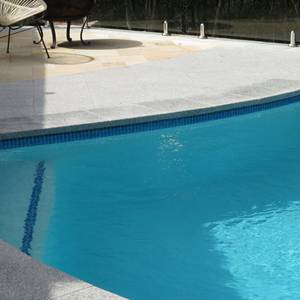 CMC330 Atlantic 23mm ceramic mosaic pool tiles in place