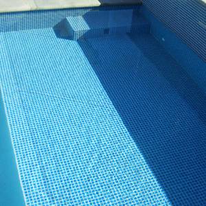 CMC330 Atlantic 23mm ceramic mosaic pool tiles in place