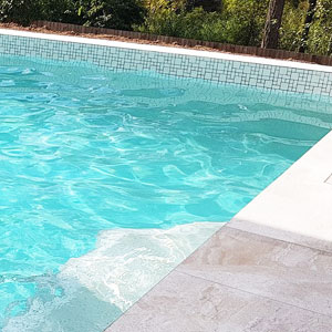 CMC473 Urban White (Ashlar) ceramic mosaic pool tiles in place