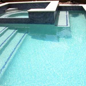 GC125 Dark Blue Gold glass mosaic pool tiles in place