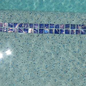 GC125 Dark Blue Gold glass mosaic pool tiles in place