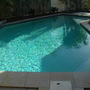 GC102 Charcoal Pearl glass mosaic pool tiles shown as waterline tiles