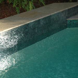 GC102 Charcoal Pearl glass mosaic pool tiles shown as waterline tiles
