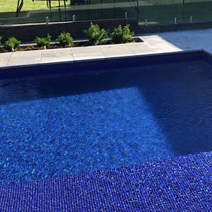 GC173 Ceylon Blue Glass mosaic tiles tiling a pools interior