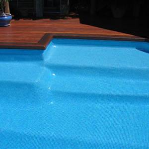 Pool tiled with GC177 Sea Green Pearl mosaic tiles