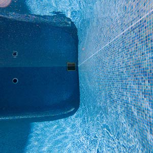Swimming pool tiled with GC185 Sky Blue Pearl blend mosaic tiles