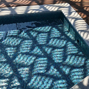 GC210 Peacock Glass mosaic tiles tiling a pools interior