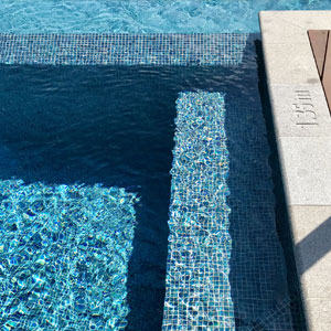 GC210 Peacock Glass mosaic tiles tiling a pools interior