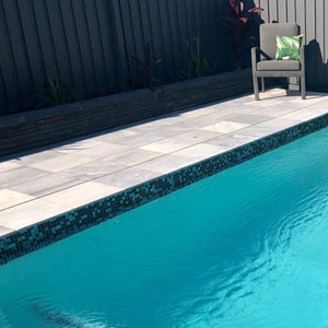 GC425 Onyx 20mm glass mosaic pool tiles in place