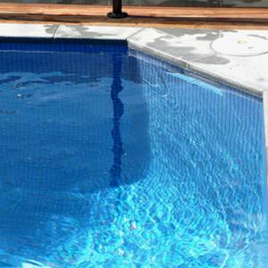 Fully tiled pool with GCR050 Azure Blue 23mm crystal glass mosaic tiles