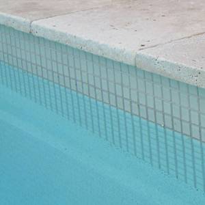 GCR150 Ivory 23mm ceramic mosaic pool tiles shown as waterline tiles