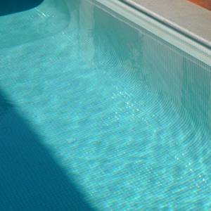 Stunning fully tiled pool with GCR220 White Crystal 23mm glass mosaic tiles