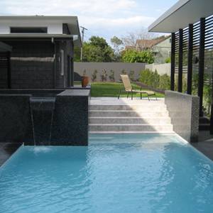 Fully tiled Spa spillover which used GCR320 Charcoal Crystal Pearl Blend 20mm glass mosaic tiles
