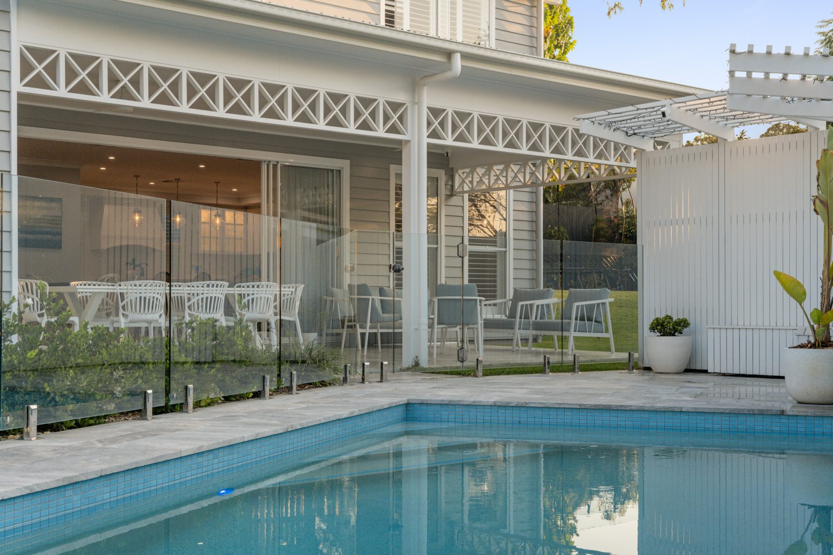 Silver Travertine walling, Silver Travertine coping and surrounds and Ice Blue waterline