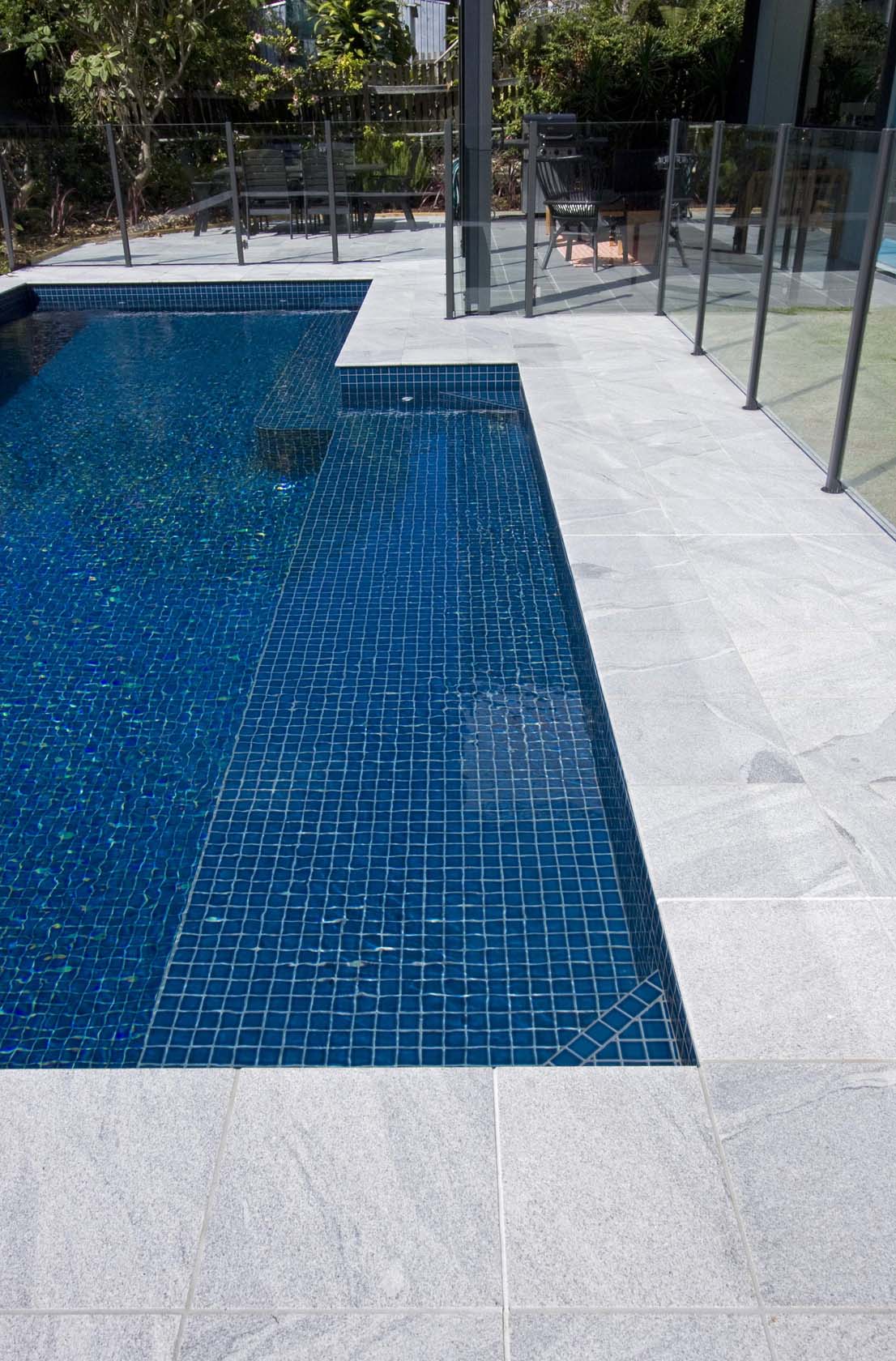 CMC098 Ocean Blue fully tiled pool with Sandwave Granite