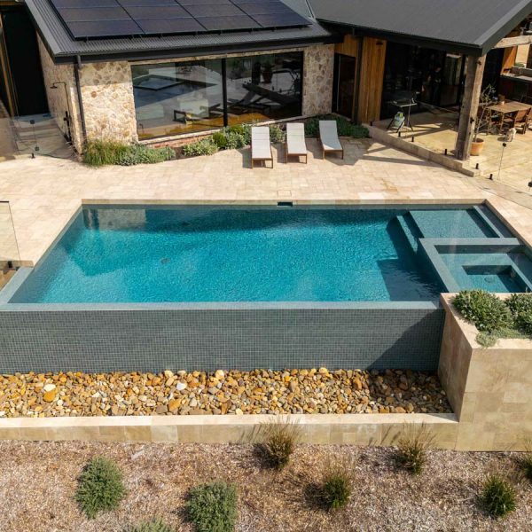 Peppercorn CMC105 fully-tiled pool high angle