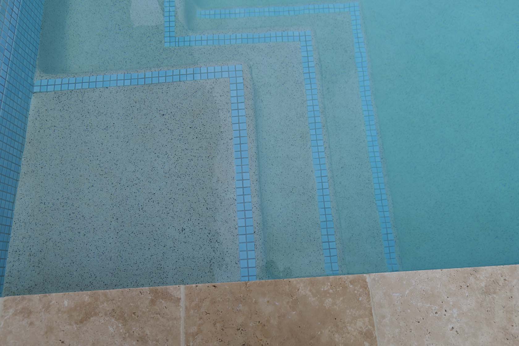 CMC129 Ice Blue used as waterline and step marker with Linen Travertine