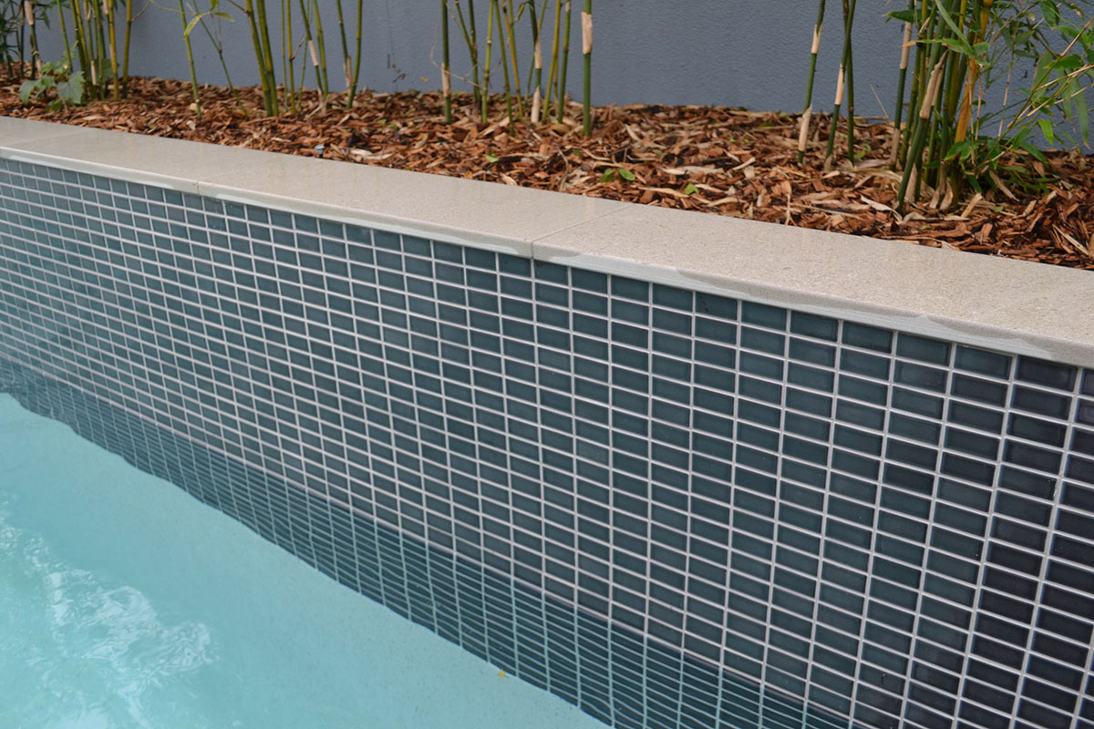 CMC306 Dark Grey waterline and pool feature wall with Mercury Porcelain Square Edge coping