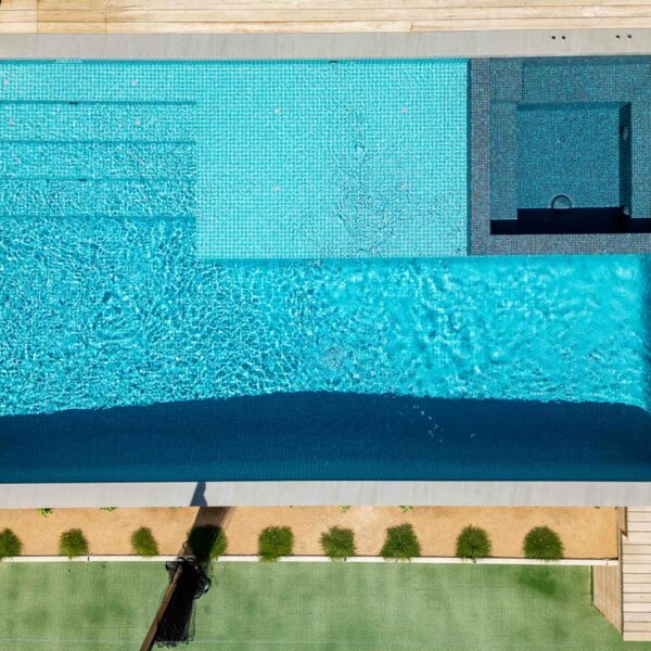 Overhead bird’s-eye view of blue ceramic mosaic pool tiles outdoor living Mt Martha Victoria