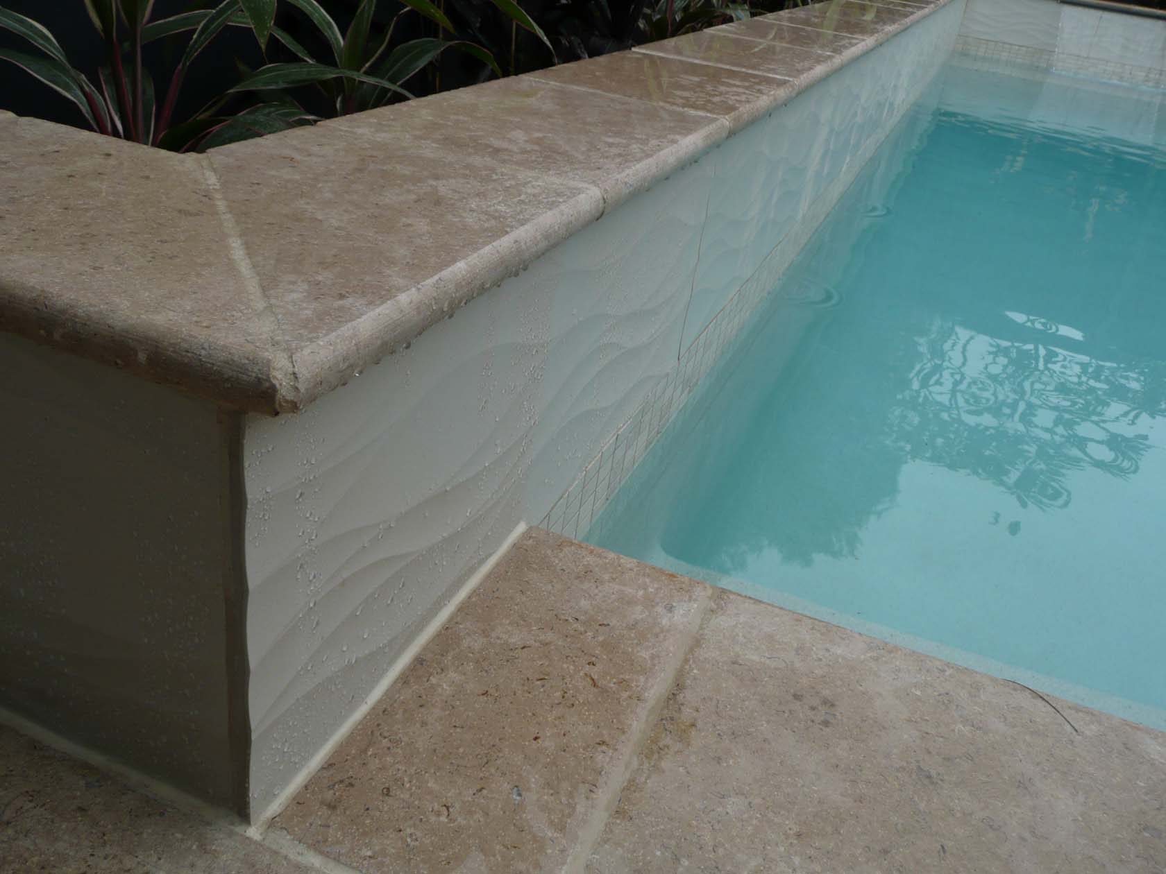 CMC401 Luna waterline tile with Dune Limestone pool coping