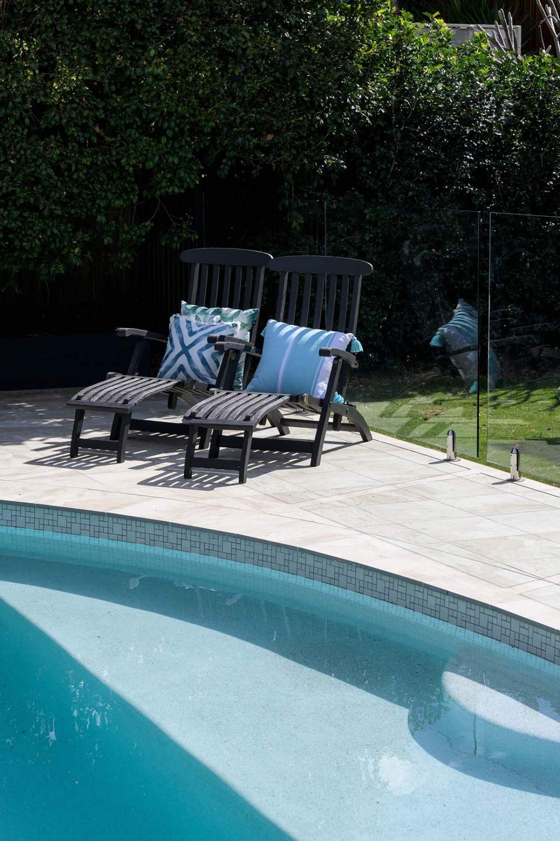 CMC473 Urban White waterline tile with Latte Marblano pool coping and surrounds