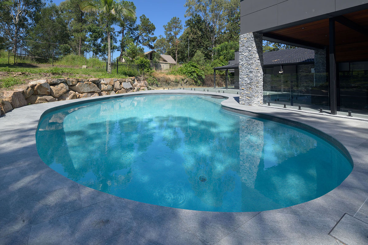 Cosmos Granito pool coping and surrounds with Graphite CMC590 waterline tiles10