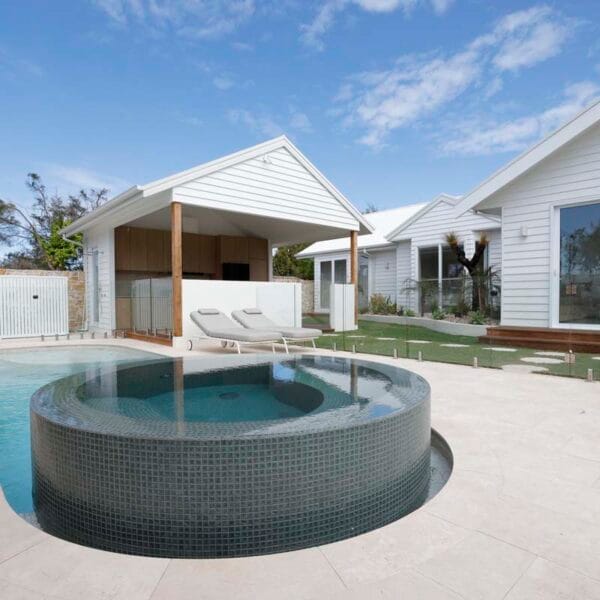 Flax Travertino Surrounds And Luna Wavy Pool And Blue Gum Spa 3