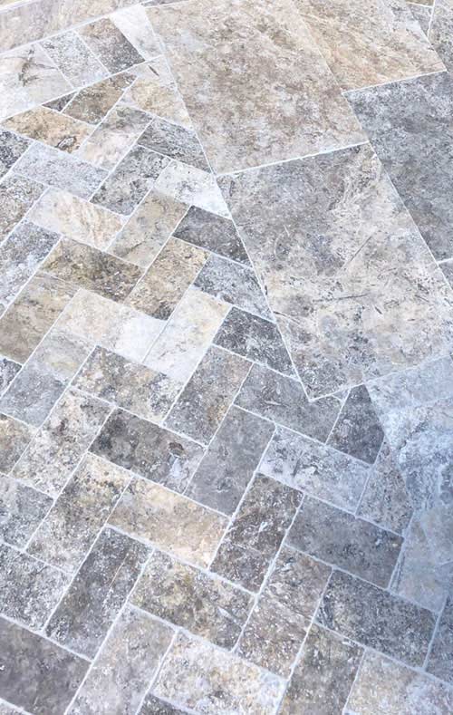 Pathway tiled with Silver Travertine Cobbles