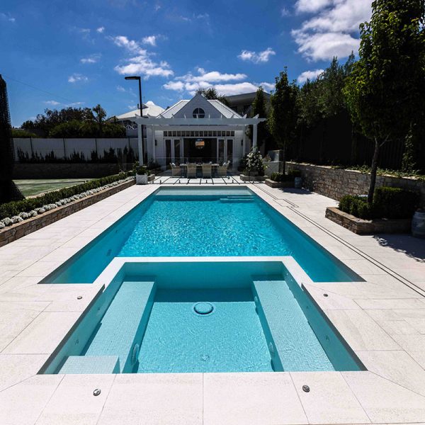 Coconut Ice GC195 fully-tiled pool with Coconut Drift Coping and french pattern surrounds (19)