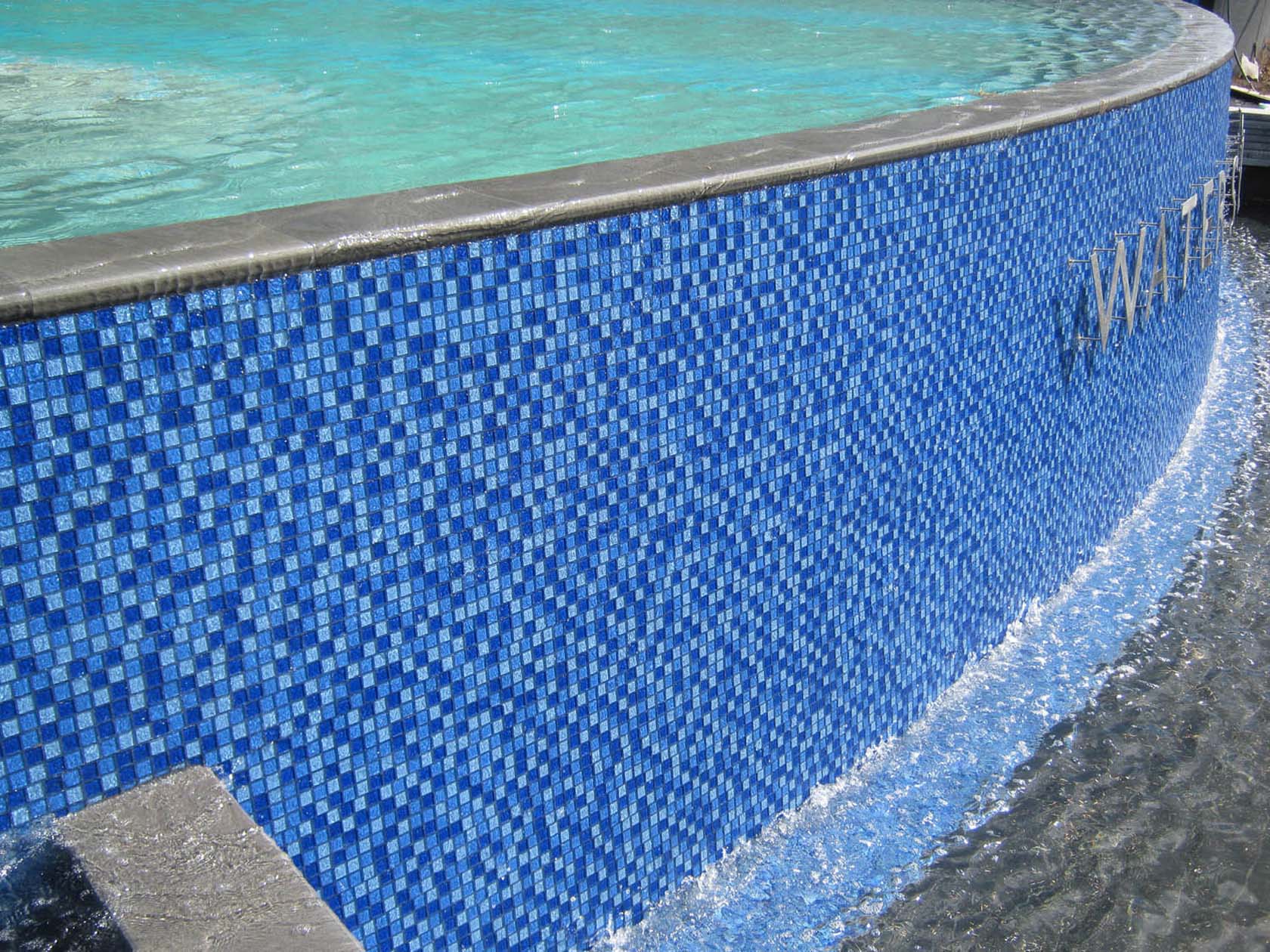 GCR080 Mid Blue Blend fully tiled hotel branded pool wall