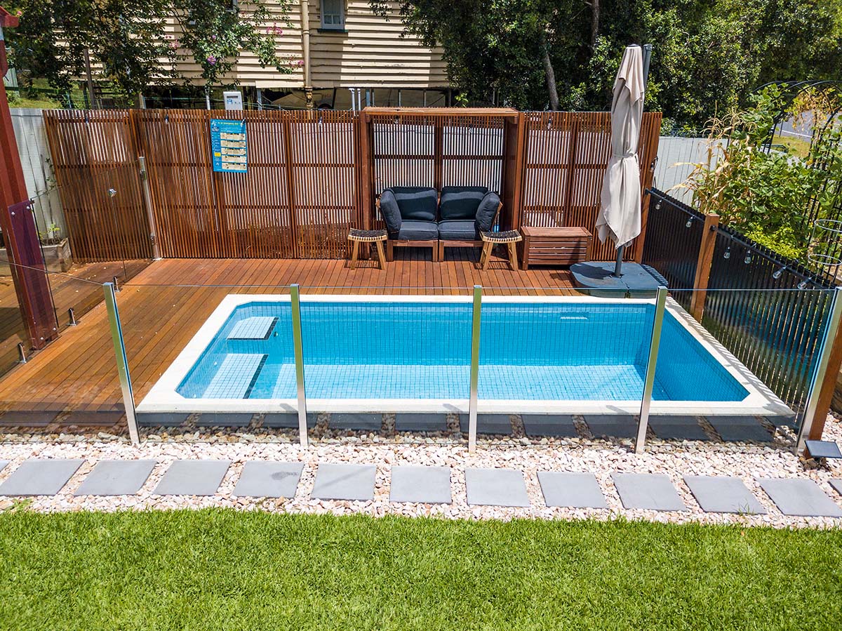 Currumbin CMC266 fully-tiled pool with Almond Granite square edge coping