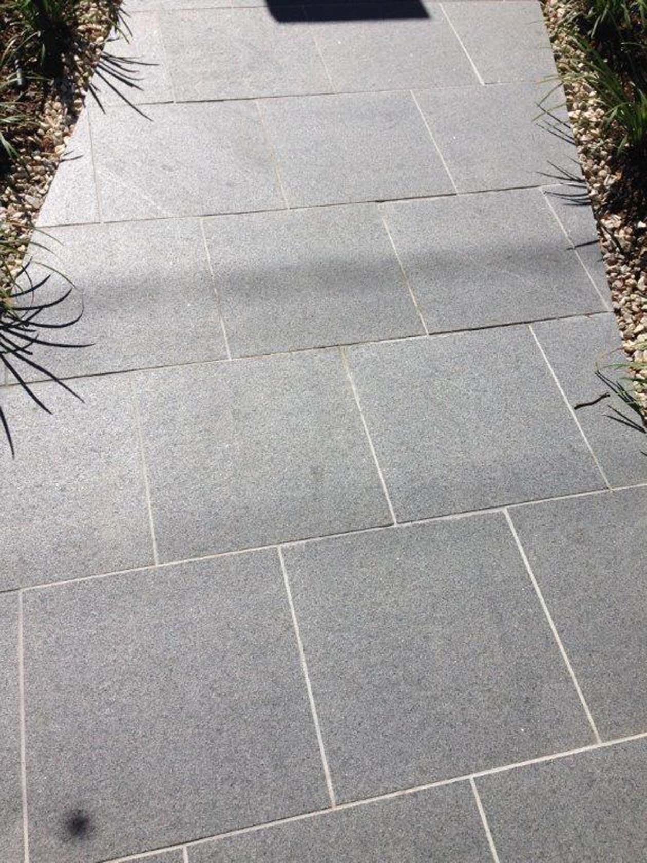 Dark Grey Granite in a Brick or Stretcher Pattern