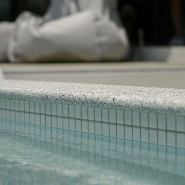 Light Grey Granite Bullnose Coping and White CMC114 Waterline Detail