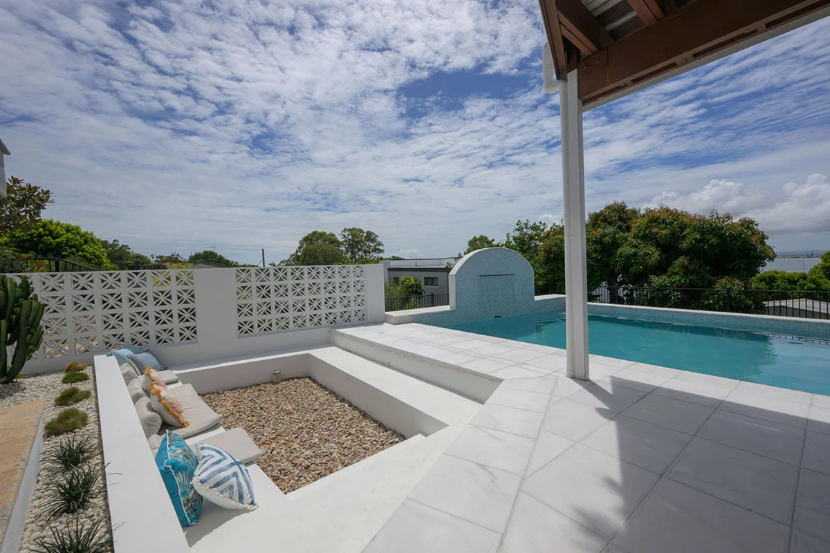 Havana White Marble square edge coping and surrounds & GC420 Alpine glass mosaic waterline and step marker