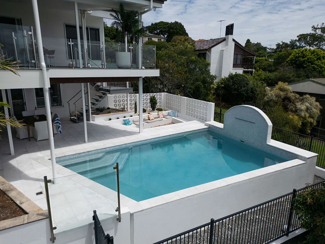 Havana White Marble square edge coping and surrounds & GC420 Alpine glass mosaic waterline and step marker