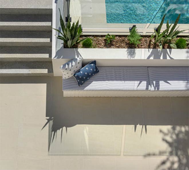 Stone look Tiles used in poolside area