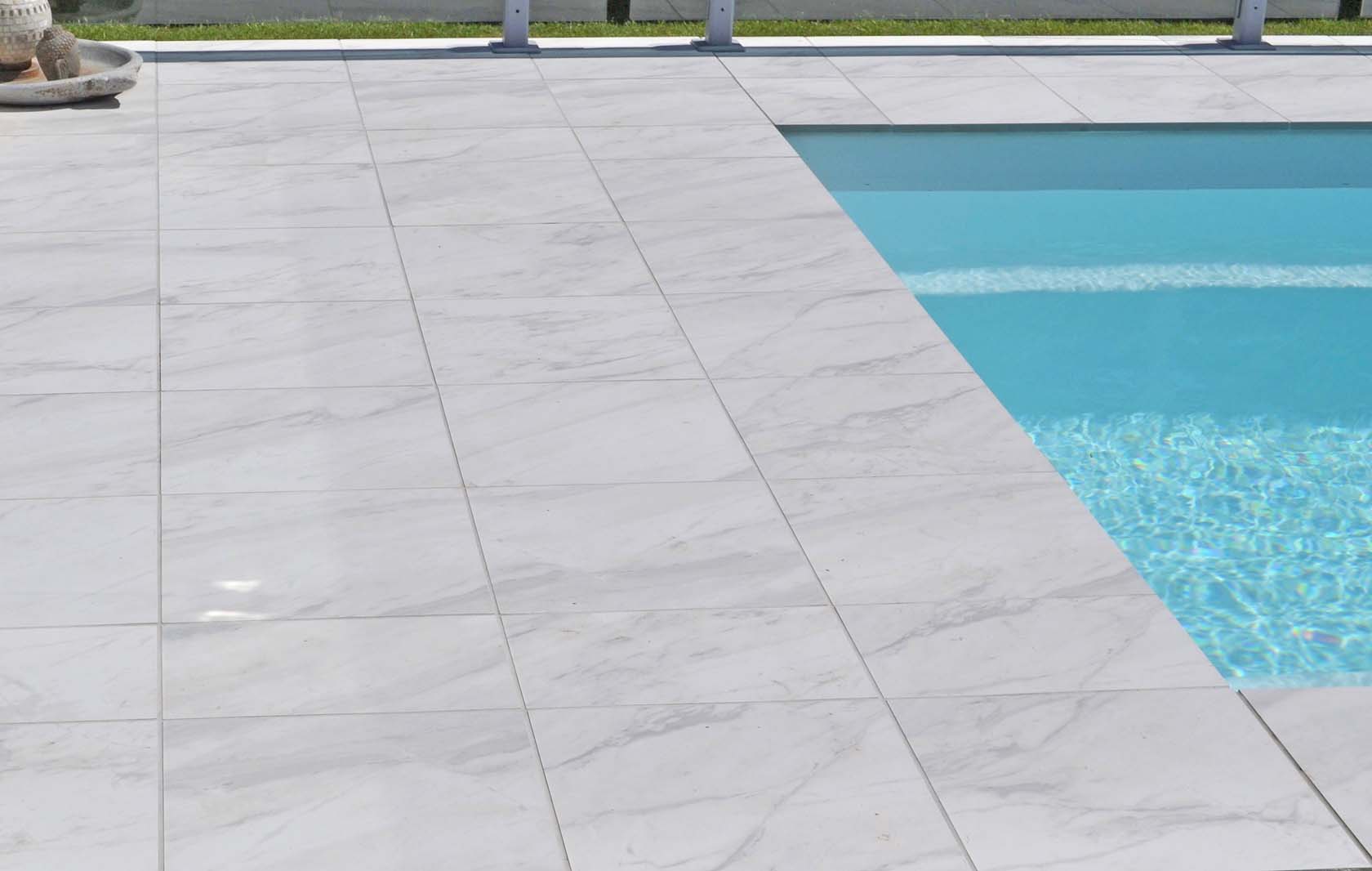 Carrara Marblano Porcelain pool coping and surround tiles