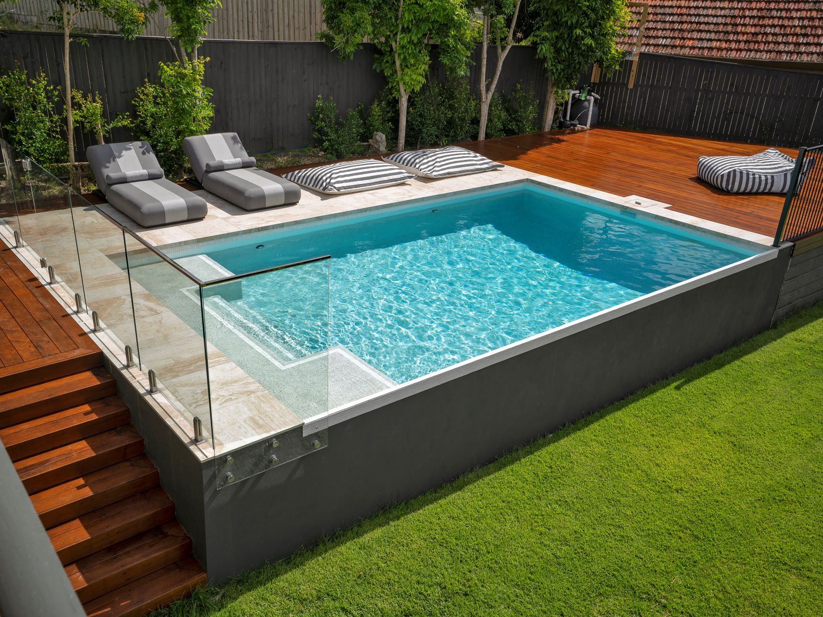 Latte Marblano Porcelain pool coping and surrounds with Urban White ceramic waterline tile