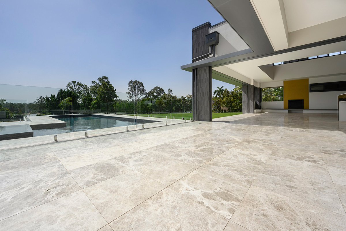 Silver Marble tiled outdoor entertainment area, pool and surrounds