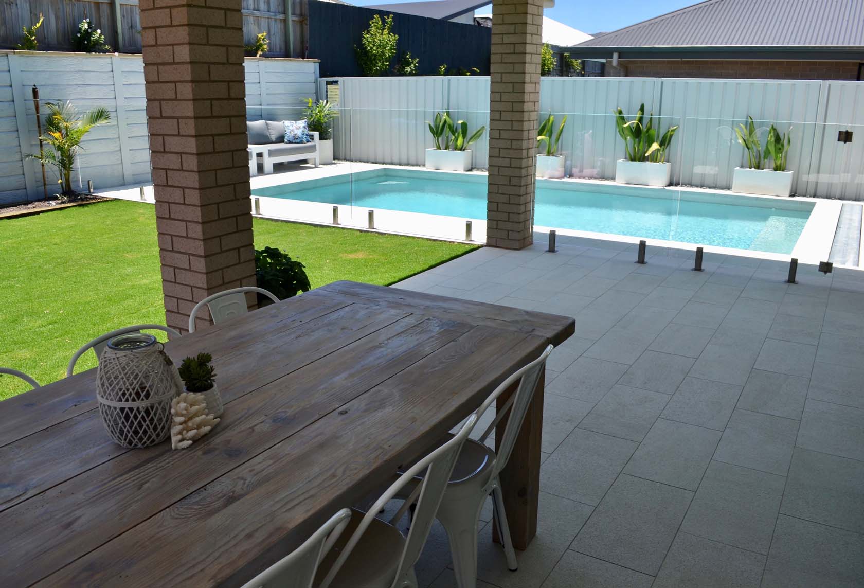 Coconut Drift Porcelain tiled outdoor area and pool and surrounds